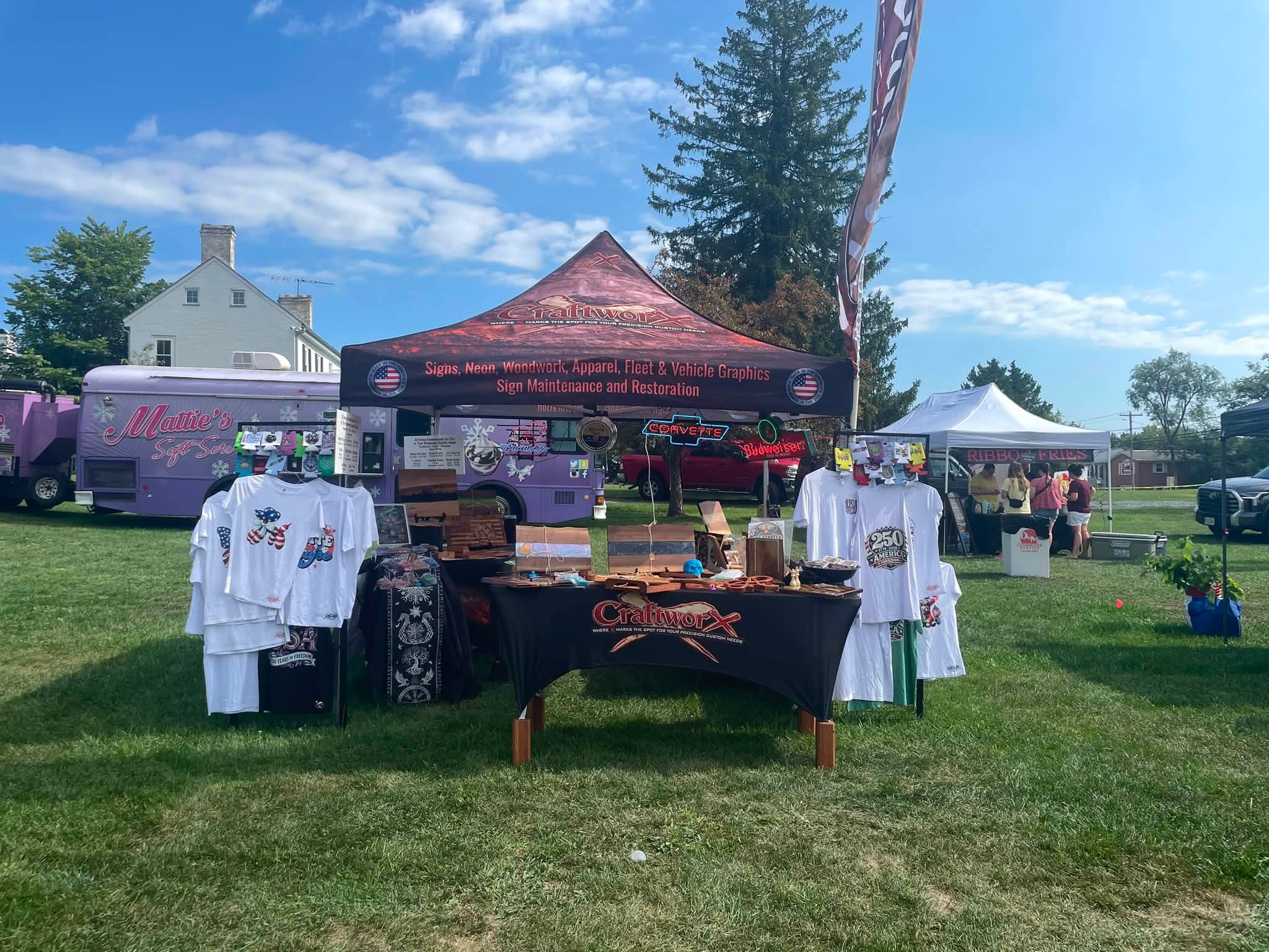 CraftworX tent and table on the fairground