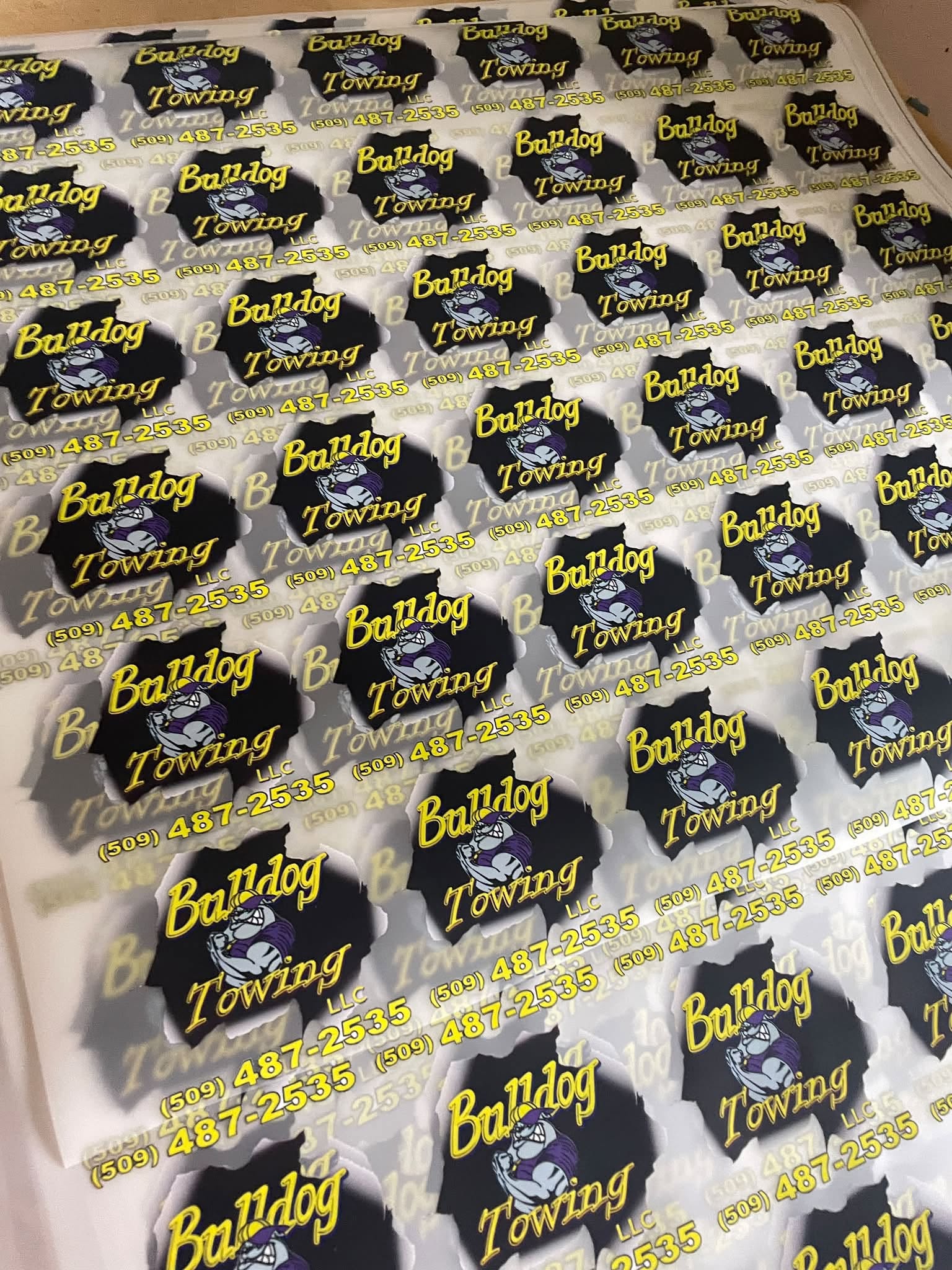 Sheet of die-cut Bulldog Towing vinyl decals