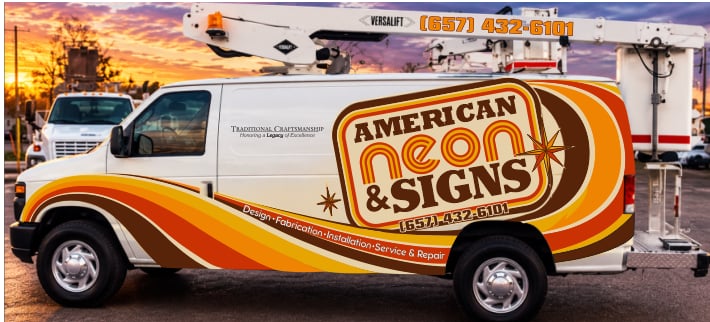 American Neon & Signs van wrap — cream, brown, and orange retro waves